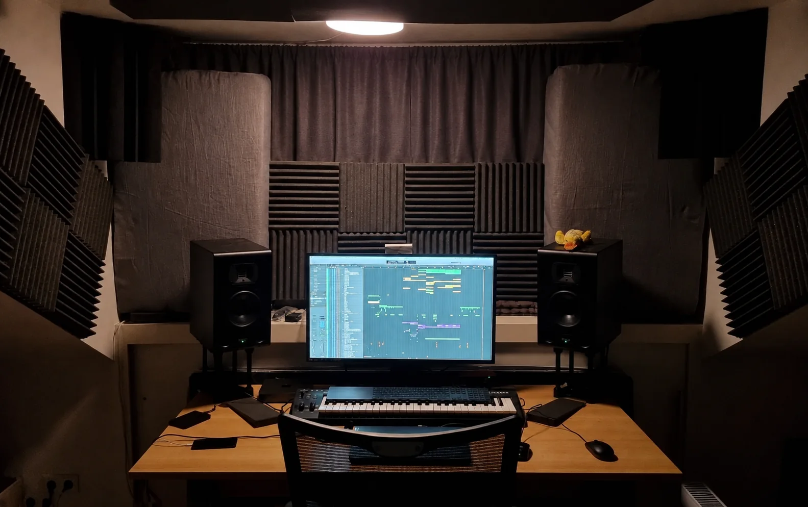 Michel Westerhoff's music studio with production monitors, keyboard and workstation